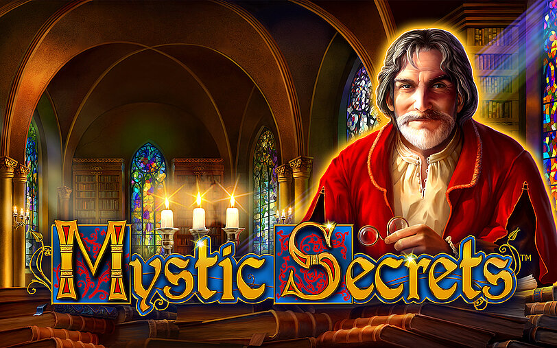 Novomatic's Mystic Secrets Logo in grosser Bibliothek mit Buntglas-Fenstern.